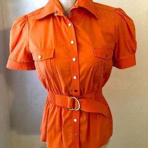 I grant orange BEBE top. Size M